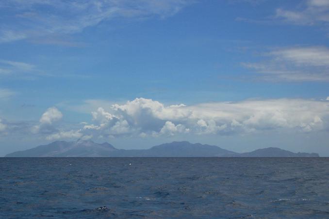 Close up of Monserrat showing smoking volcano