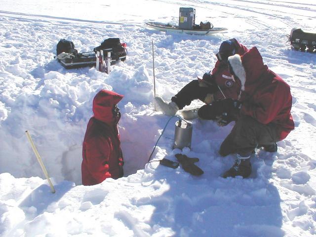 Pulling out the seismometer.