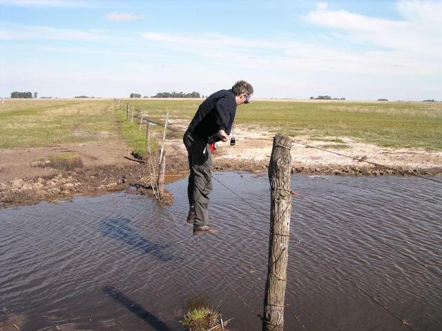 Balancing on the fence over the water