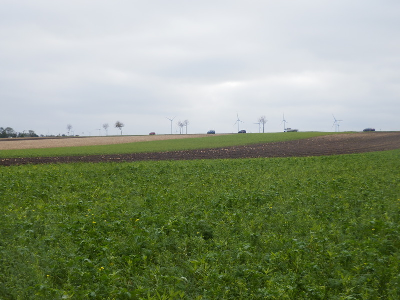 View to the road with heavy traffic and wind turbines