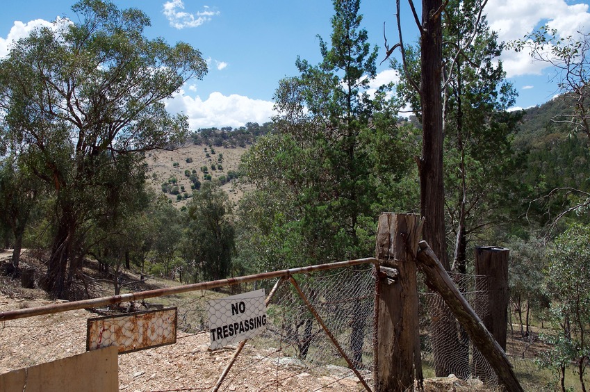 Looking towards the point from a gate (with a "No Trespassing" sign - 1.8 km away