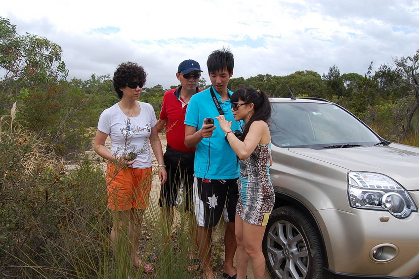 Misha explaining to Sean how to use the GPS to find the confluence