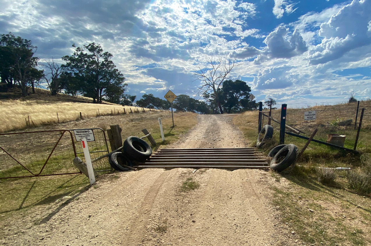 The gate (with private property signs), 552 metres from the point