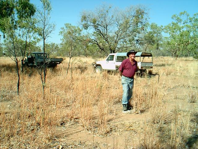 Fred Hodge standing on a cow pat.