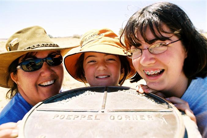 Wife Keyla with daughters Tari and Elodie at the Corner Post