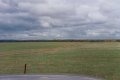 #3: The track beside the fenceline towards the confluence.  See the thunderclouds!