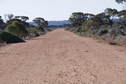 #9: This is the good road, looking back to the hills at Madura