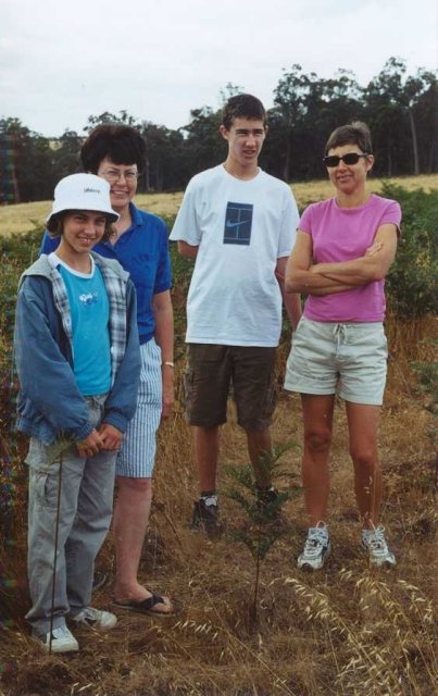 Visitors With Stake Marking The Spot Near Mini's Leg