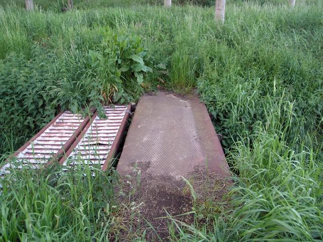 Steel bridge over one of the many ditches