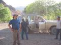 #10: Jon and Bob (in passenger seat) getting ready to depart.  Note the locals hiding behind the car, you can see them peeking through the rear window