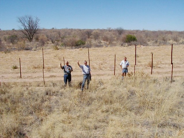 The Confluence is about 150 m behind the people in the photograph, across the border