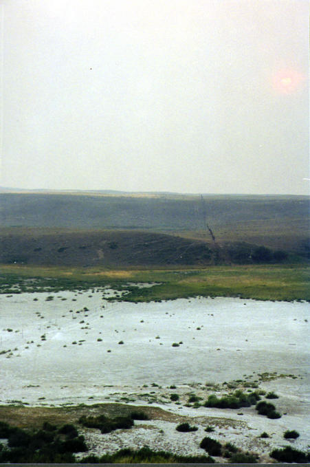 Looking west along boundary cutline into smoke.