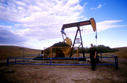 #7: Mark beside oil well (confluence is behind the trees in the background).