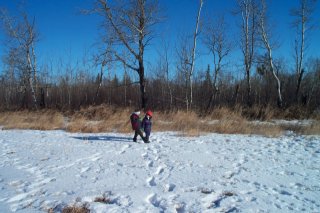 #1: Looking east my son holding the GPS receiver and my daughter waiting to go back to the car