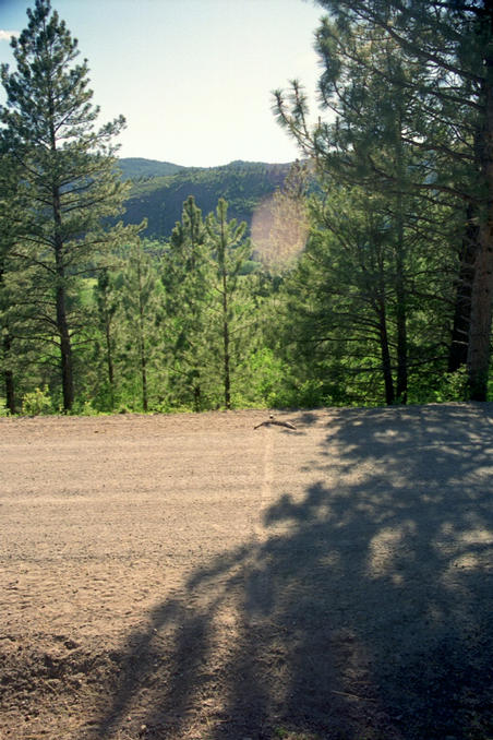 Arrow on the road pointing to confluence