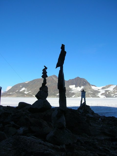 the mountain during the day with a rock sculpture we made