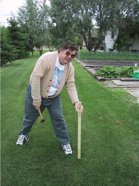 Dave putting in a marker stake