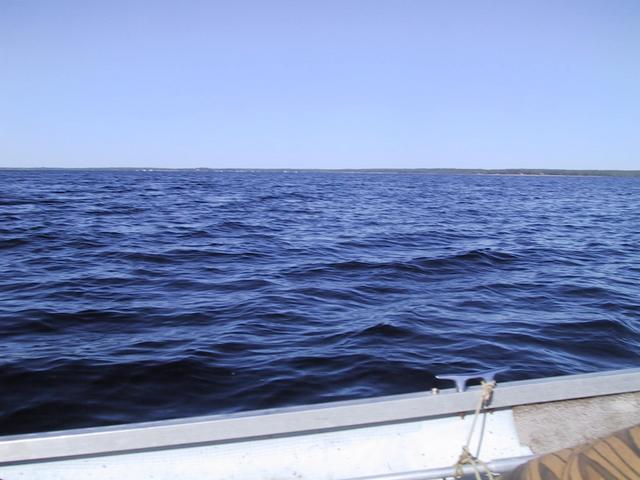 At 46N 66W.  View to the west from the confluence point.  The long reach of the lake is to the southwest from this location.