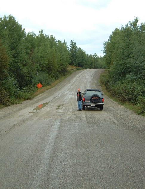 The end of the paved roads, still 15 km to go.