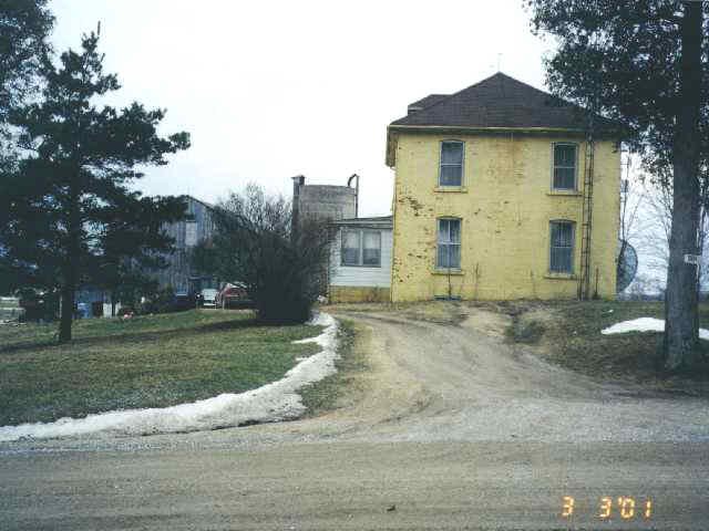 the farm buildings from the road