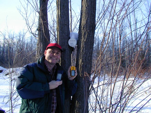 Steve discovers geocache at confluence