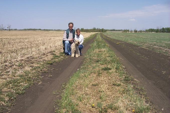 The confluence visitors on the trail between fields.  About 213 m west of the CP.