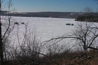 #1: Looking west over Martin's Lake.  The confluence is just beyond the truck on the right.