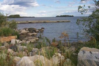 #1: The confluence is about 21.4 km straight out in the center of the picture.