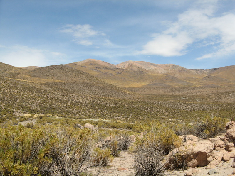 Midwayon the hike to the Confluence - It is in the center of the photo behind the rocky ridge