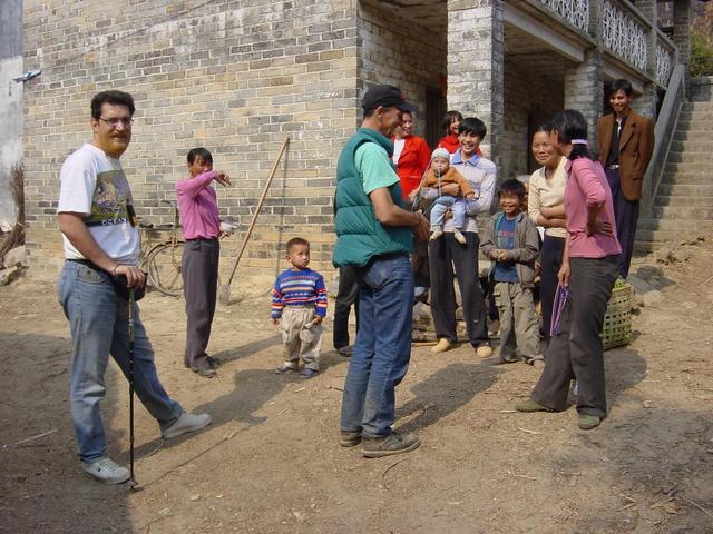 Richard entertaining the locals in the village by the confluence