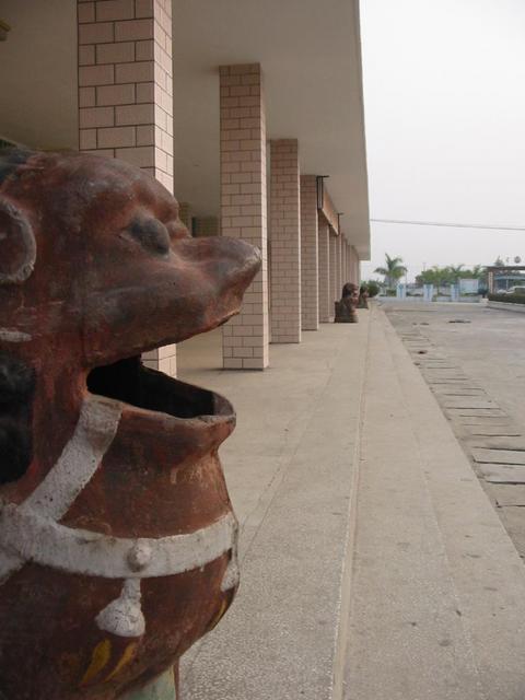 Interesting rubbish bins along the front of the lonely Qinzhou Railway Station