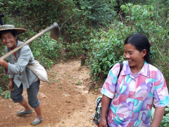 Hiking up trail; woman who escorted me on right.