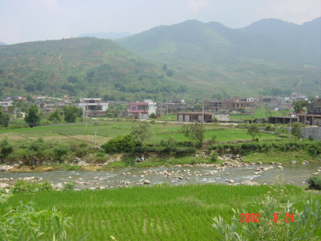 Confluence on hillside on opposite side of river valley.