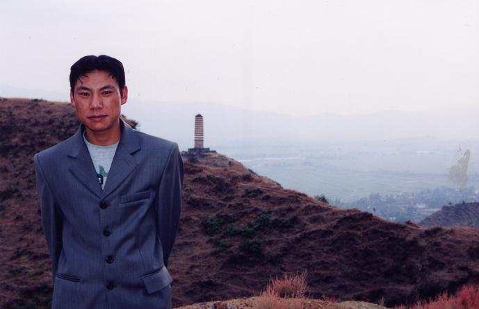 Our Bai driver and the pagoda