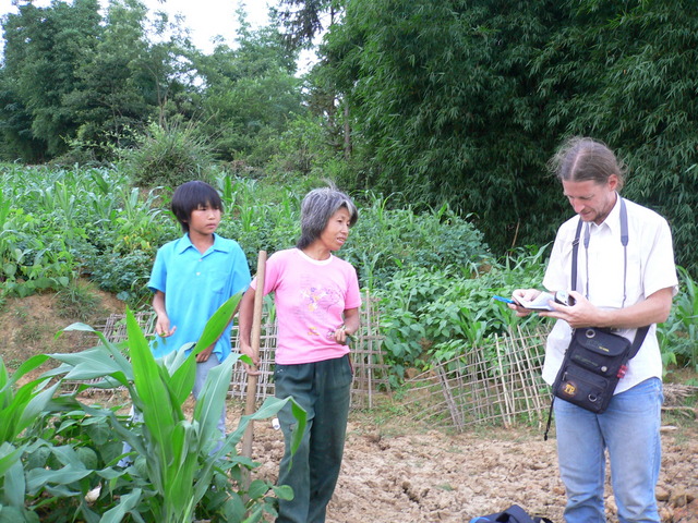 Locals telling Targ the place name: Xīnmín Village Group Three.