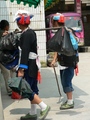 #2: Women in Huángpíng in traditional minority nationality costumes.