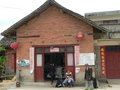 #3: Ah Feng outside the shop in Dǐngfāng where we left our luggage.