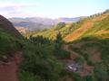 #7: On the trail leading to the confluence, but heading back towards my starting point on one of the far hills.