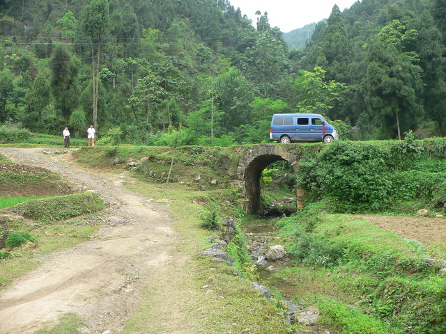 We left the minivan with the confluence 1.17 kilometres SE, and set off along a dirt road.