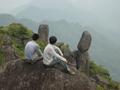 #10: Xie Huangpeng (left) and Huang Kangjun contemplating journey back