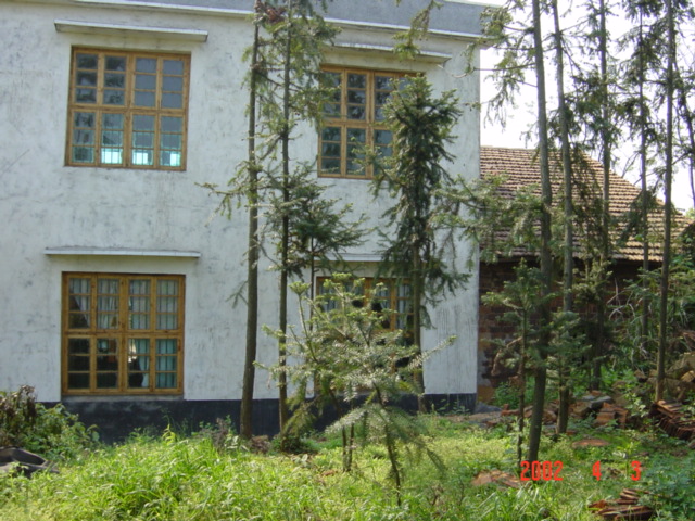 Facing south - confluence right up against back wall of farmhouse