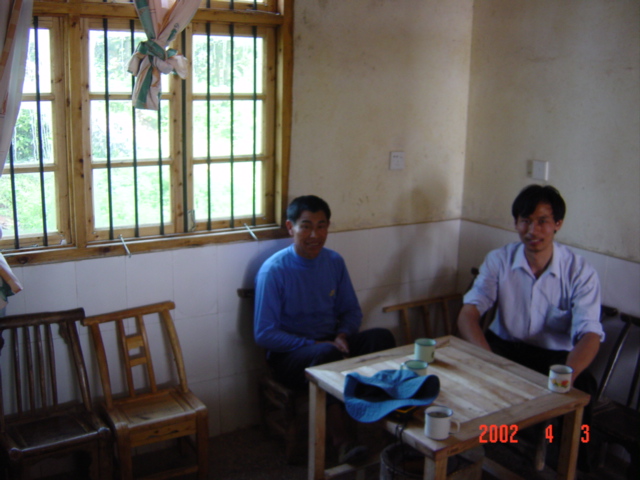 Farmer (left) and driver - confluence just outside window