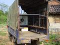 #2: Wooden planks made uncomfortable seats in the back of this three-wheeled truck