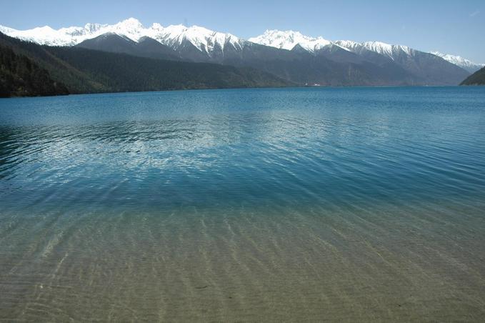 Western end of the Basomtso lake - confluence point located behind the lower ridge on the left