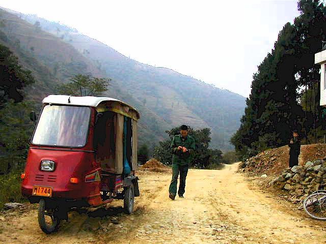 Motor-tricycle taxi and my driver