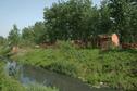 #8: Front view of the village with polluted canal