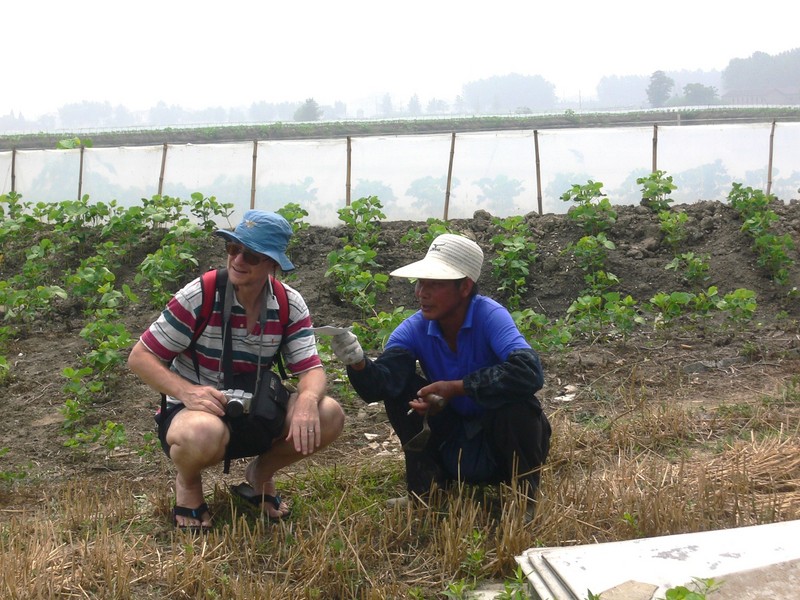 Fish farmer explaining to Targ what is to become of the confluence area