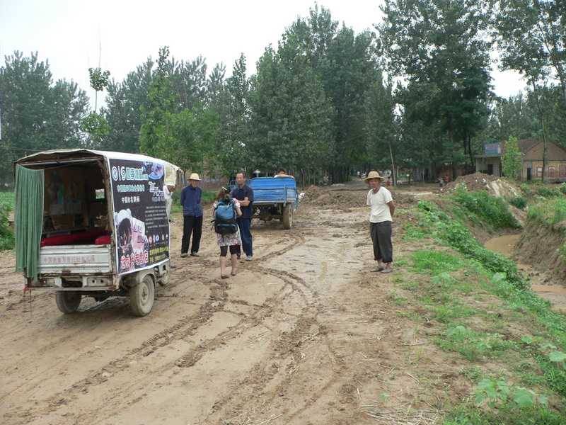 Ah Feng next to our tuk-tuk at the roadblock at Tiānjí Village