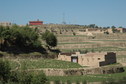 #5: A distant view of the monument tower from the nearby village