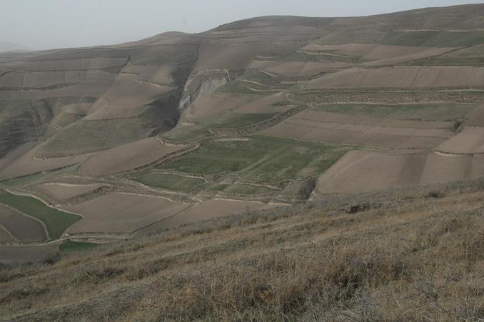 Distant view of the conflence point - near the skyline between the two gentle humps